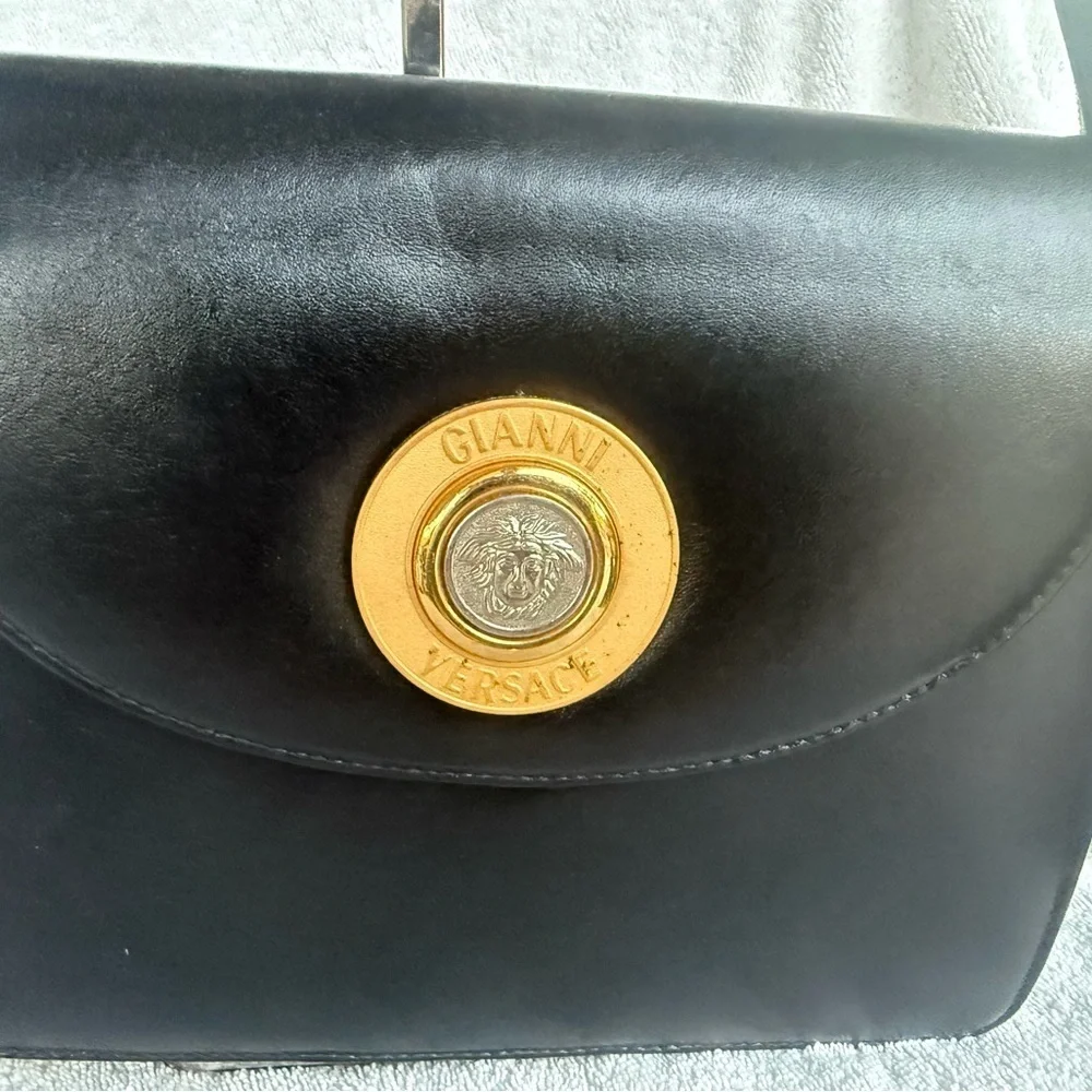 Versace Black and Gold Shoulder Bag with Leather Material and Compact Shape